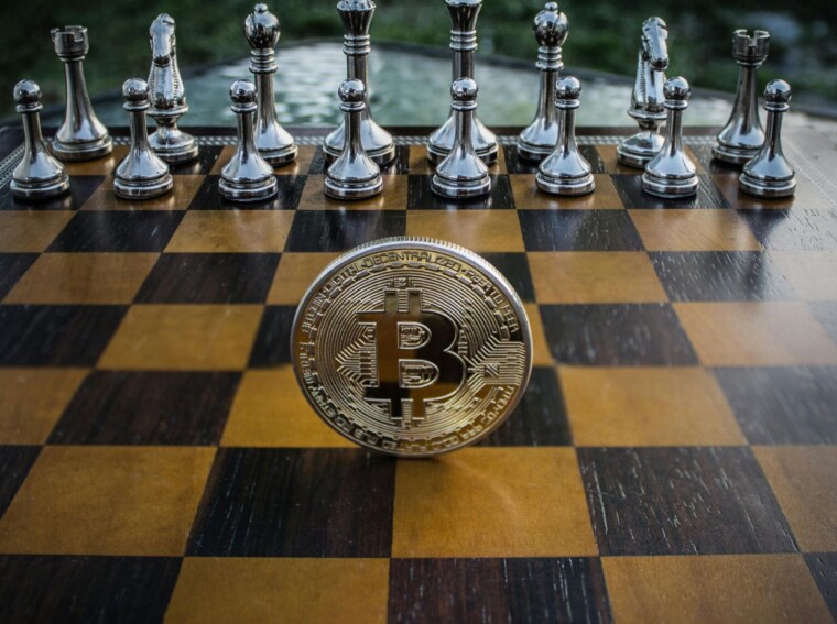 Bitcoin strategy coin on chessboard